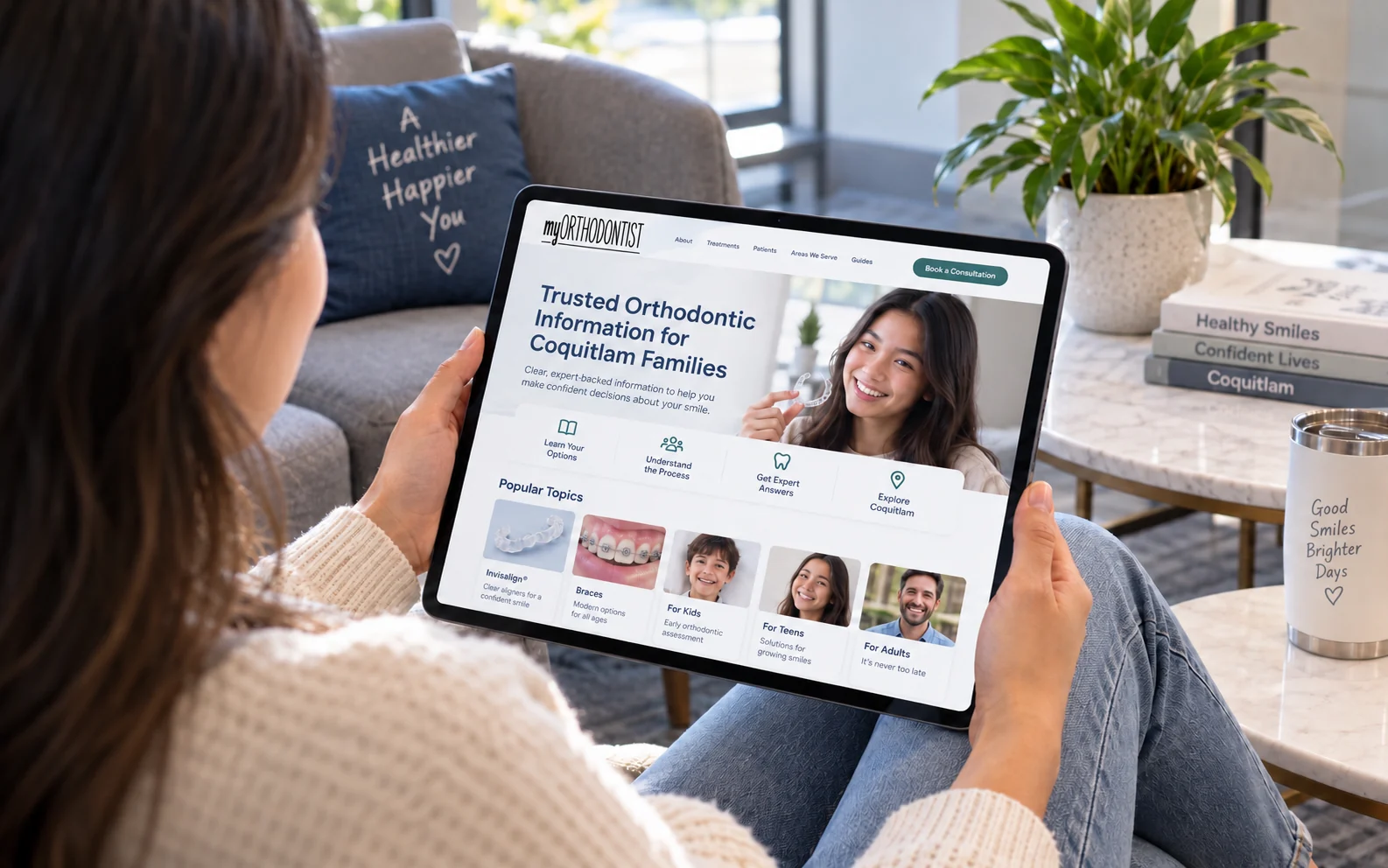 Patient reading clear orthodontic educational information on a tablet